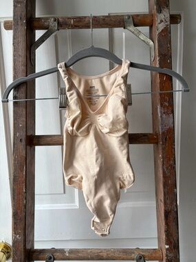 SKIMS Kids One-Piece Bodysuit in Light Beige